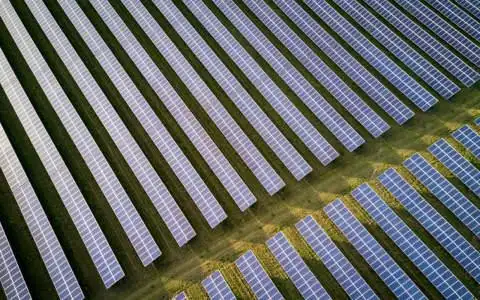A modern mining farm bustling with activity and advanced technology